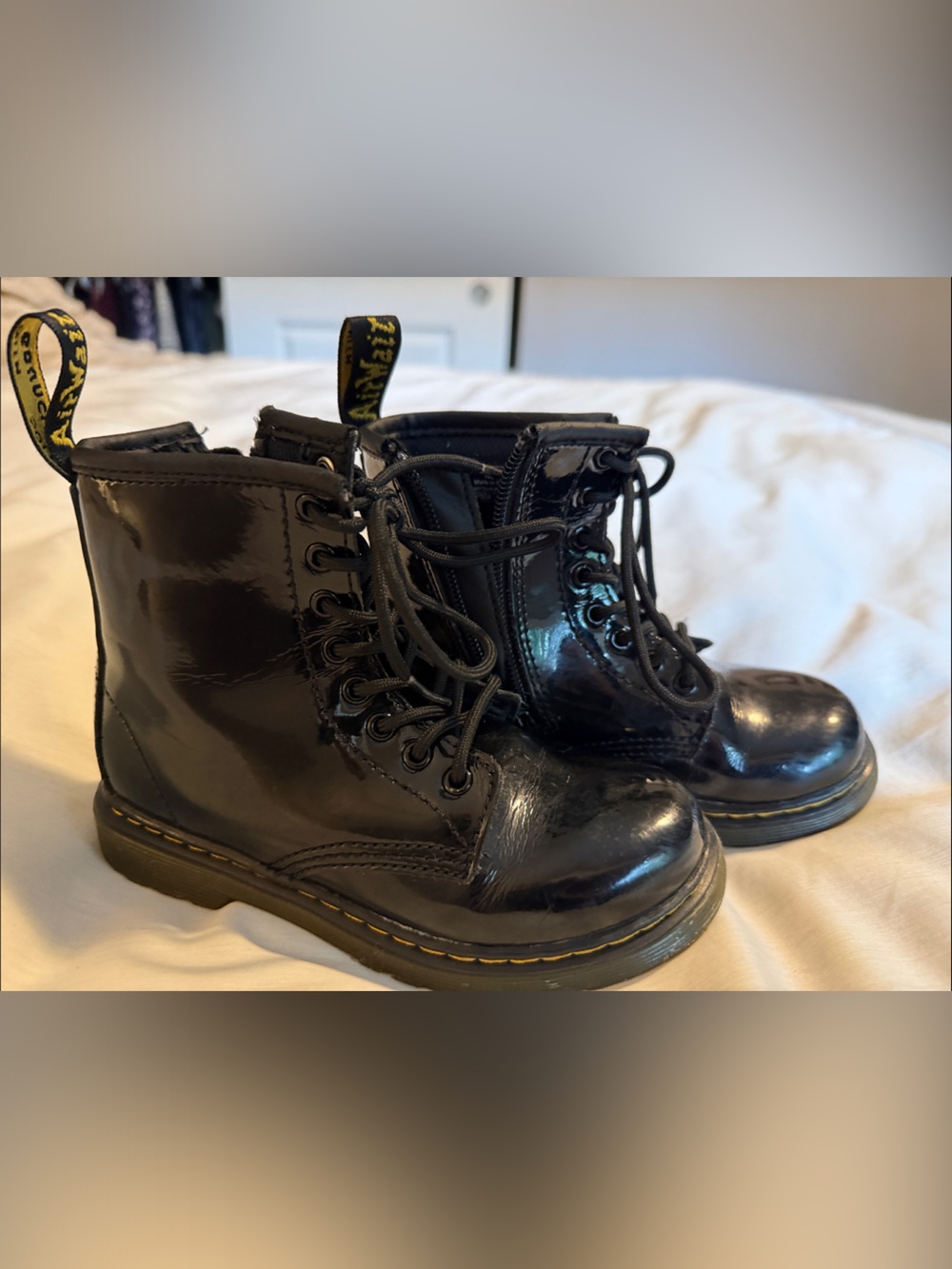 Dr. Martens Black Patent Lace-Up Ankle Boots with Yellow Heel Loop